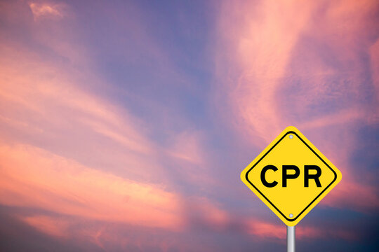 Yellow transportation sign with word CPR (abbreviation of Cardiopulmonary resuscitation) on violet color sky background