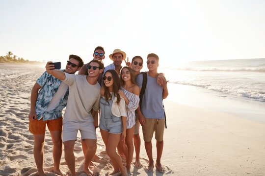 Group of Happy Young Friends Taking a Selfie on a Sunny Beach During Summer Vacation Lifestyle Travel