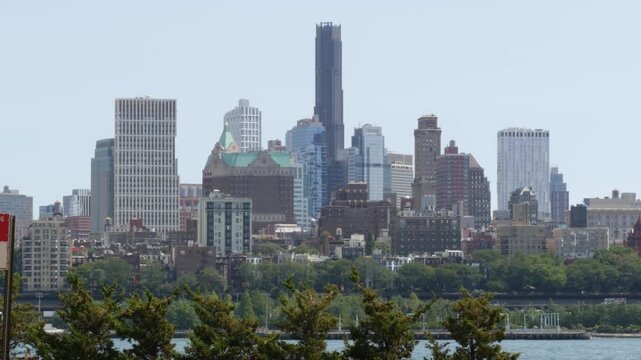 New York City Brooklyn Heights skyline from Manhattan, United States. Riverfront residential district near Dumbo and Brooklyn Bridge cityscape. Waterfront building architecture. FDR drive road highway