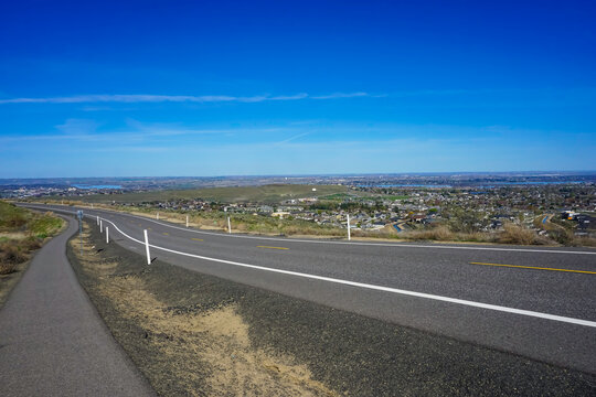 Road in Tri-Cities Washington with Pasco Kennewick and Richland in distance