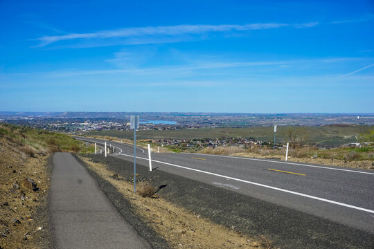 Road in Tri-Cities Washington with Pasco Kennewick and Richland in distance