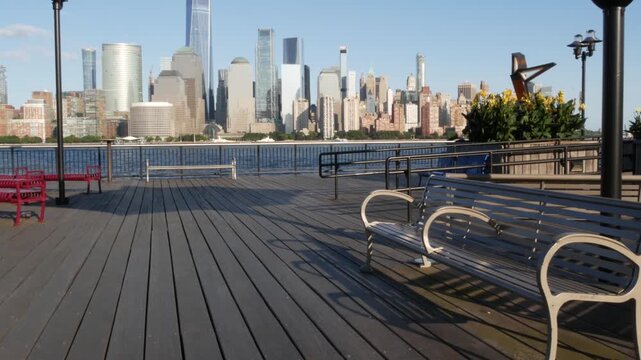 New York City Manhattan downtown financial district skyline, New Jersey Exchange Place, United States. Urban cityscape with skyscraper buildings, World Trade Center. J Owen Grundy park, Paulus Hook.