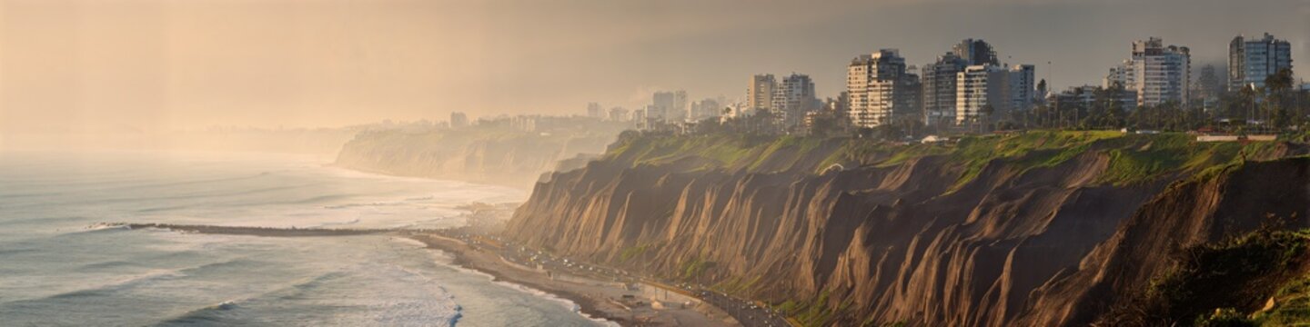 Coastal City Skyline: A breathtaking panoramic vista unveils a majestic coastal city, perched gracefully on rugged cliffs that embrace the vast expanse of the ocean.