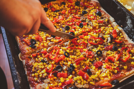Homemade pizza with vegetables and fish