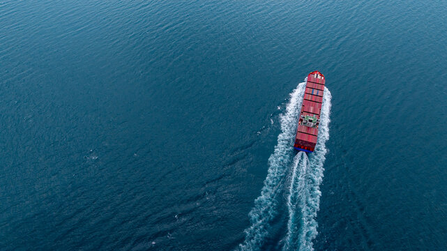 Aerial view container cargo ship carrier container on sea, Global business logistics transportation by container cargo ship, Container cargo ship freight shipping import export supply chain.