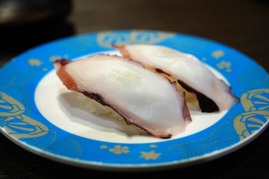 Close-up of delicious cooked octopus nigiri sushi, Japanese seafood cuisine
