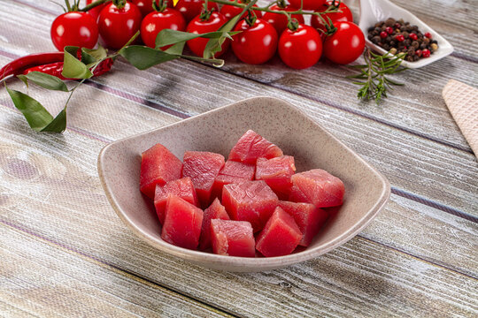 Raw tuna fish cubes heap