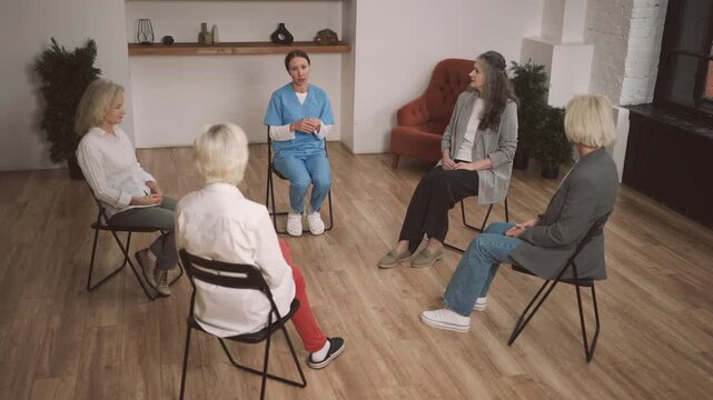 Group of support women mental health in old age, emotional wellness for ladies. Gynecologist or endocrinologist consulting senior females about better aging and stay healthy in menopause period