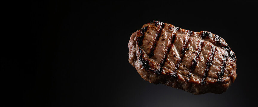 Succulent grilled meat pieces float dynamically