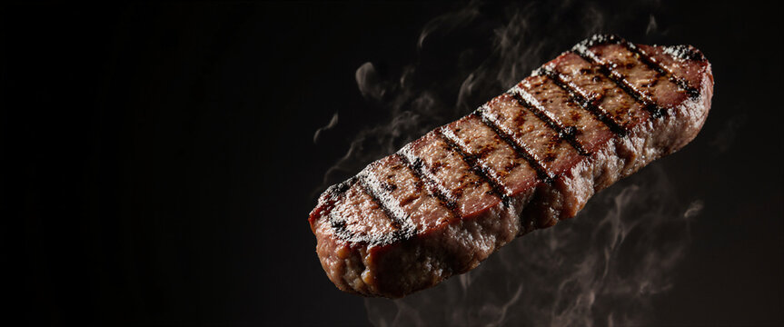 Succulent grilled meat pieces float dynamically