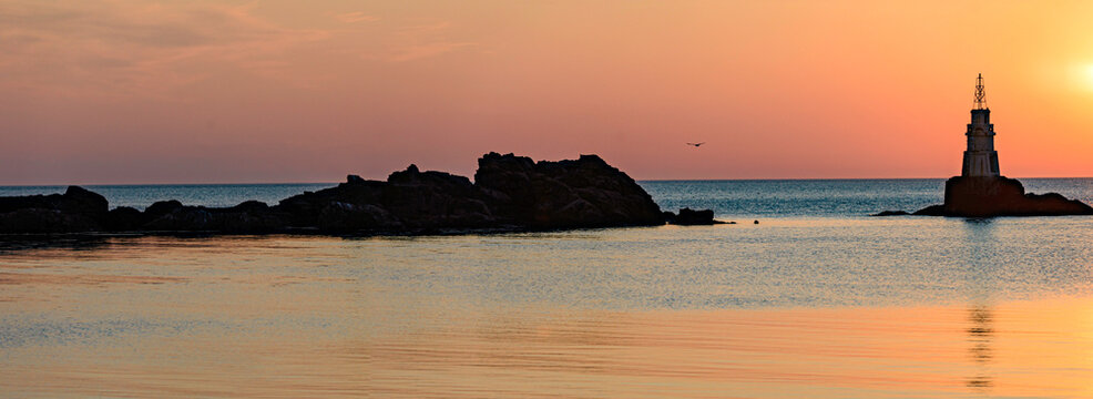lighthouse at sunset