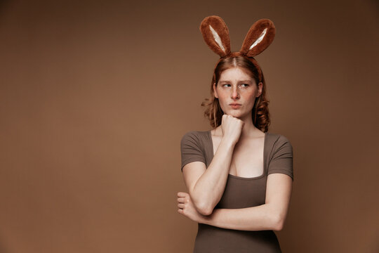 Easter Bunny Girl in Brown Dress, Soft Gaze