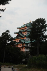Obraz premium Historic Japanese Castle With Green Roof