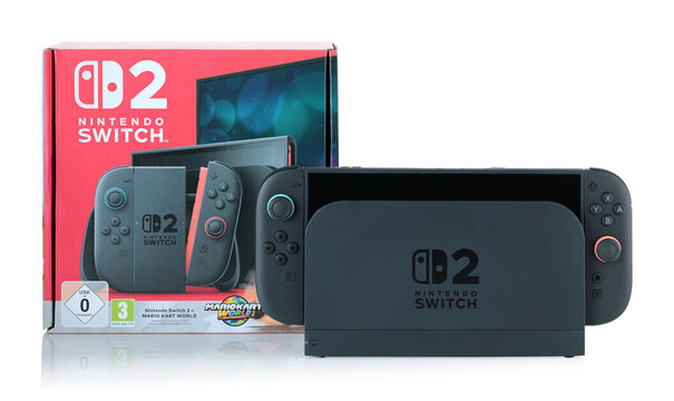 Nintendo Switch 2 gaming console in dock station with original retail packaging, isolated on transparent background with natural reflection