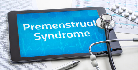 The word Premenstrual Syndrome on the display of a tablet