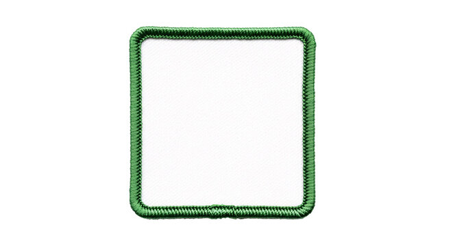 White square patch with green border on checkered background.
