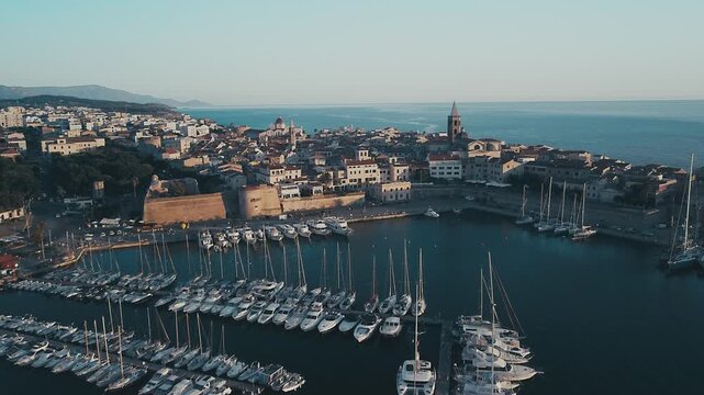 Drone in moving from the port to the historic center with its beautiful cathedral