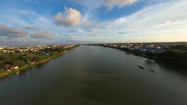 A smooth drone flight moves forward over the calm waters of Tanjung Bunga, the downstream area of the Jeneberang River in Makassar