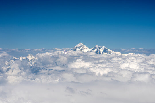 Himalayas Nepal, peak of Mt Everest above clouds