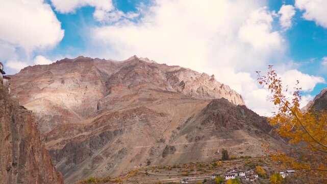 Beautiful landscape of Indian Himalayas during autumn season in Zanskar, Ladakh, India. Tall mountain and clouds in sky near Phugtal monastery. Travel and exploring hidden gems concept.