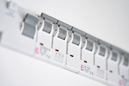 Close up of circuit breakers in electrical distribution panel. Concept of power distribution electrical safety protection and household infrastructure