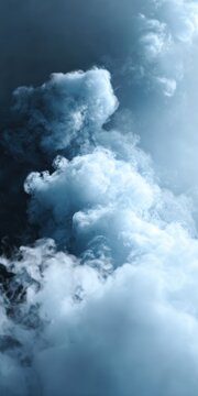 Blue smoke creating abstract shapes and a dynamic vapor background