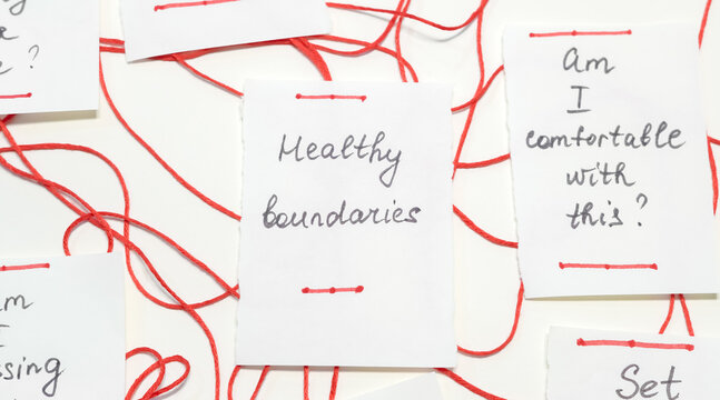 Cards with handwritten questions about healthy boundaries and self-reflection