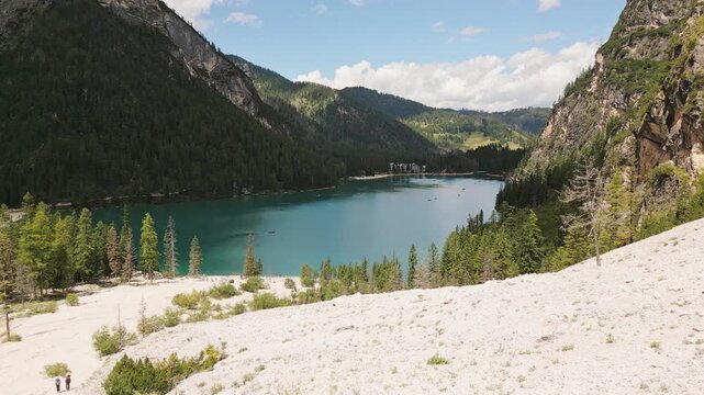 Aerial view Lago di Braies lake in Dolomites mountains. Dolomiti. Italian alps. Turquoise lake in northern Italy. Popular summer visit destination Europe. Glacier alpine lake - Pragser Wildsee