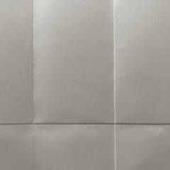 Fototapeta premium Textured folded gray paper surface