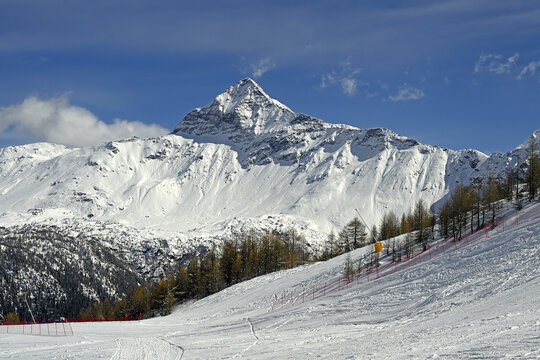 Pizzo Scalino, it is a mountain of the Bernina Range in Lombardy, Italy. It is known as the Valmalenco Matterhorn due to its pyramidal shape when viewed from the valley.
