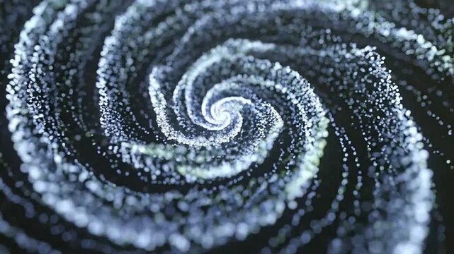 A glowing spiral pattern formed by many small bright particles on a dark background