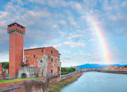 The Guelph Tower and Medici Citadel on the Arno River in Pisa, Tuscany, Italy.