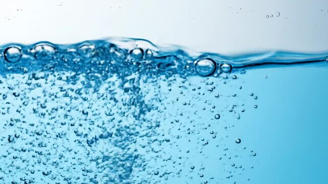 A fluid abstract pattern of light blue swirls and delicate air bubbles creates a clean, airy background for modern cosmetic and wellness concepts.