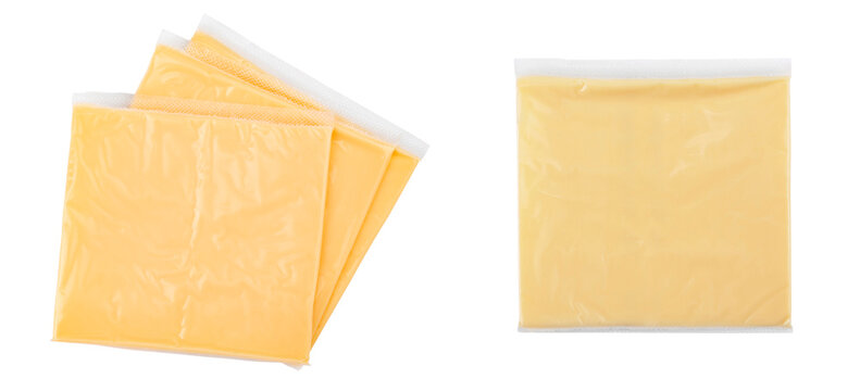 Processed cheese slices in plastic packaging isolated on white background. File contains clipping path.