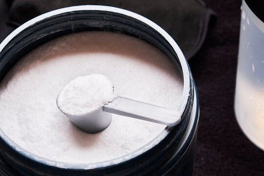 Creatine Monohydrate Powder in Bottle