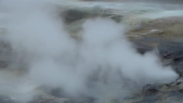 Steam Vent in Nature: Captivating close-up of steam vents, nature's raw energy is vividly showcased with billowing clouds rising from the earth's core. Generative AI.