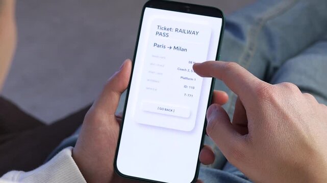 Close-up of a user interacting with a modern travel booking app on a smartphone. Features a clean neumorphic UI while selecting a train ticket. Ideal for tech, mobile development, and digital