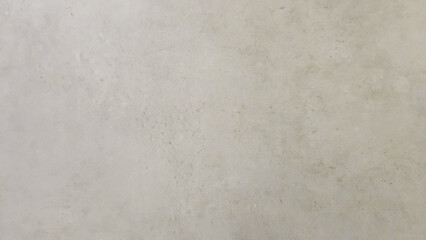 Obraz premium Abstract concrete texture background with light gray tones and subtle imperfections, perfect for creative design, advertising, and modern visual concepts.