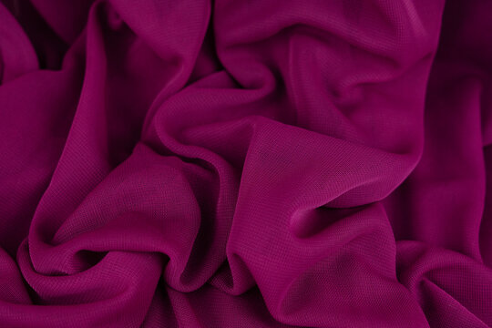 pink fusia soft wavy fabric material background 