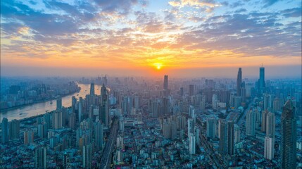Obraz premium Skyscraper city skyline urban architecture aerial sunset buildings river perspective grid lights modern corporate business glass reflection dramatic clouds golden sunlight cinematic depth