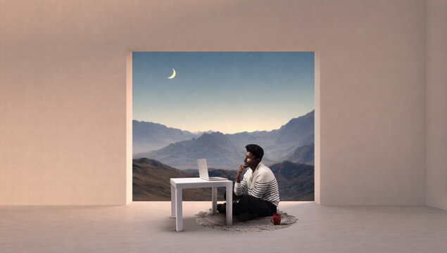 Man working on laptop at small table in empty room with mountain landscape at night. Concept of late night workflow, strategic thinking session, remote work isolation, deep focus atmosphere