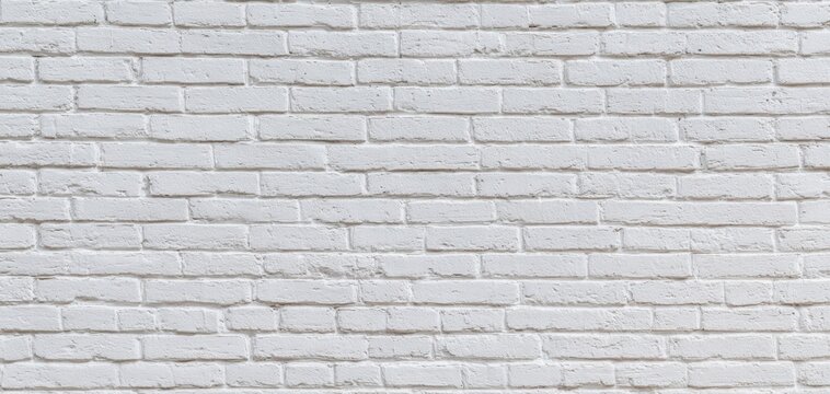 The White Brick Wall Background with Rustic Texture and Minimalist Urban Aesthetic