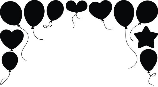 Black balloon arch forms festive decorative border with hearts.