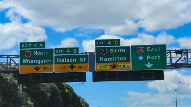 Overhead Highway Destination Signs on State Highway 1 in Auckland, New Zealand