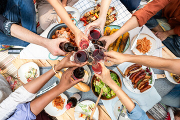 Joyful picnic with diverse friends.