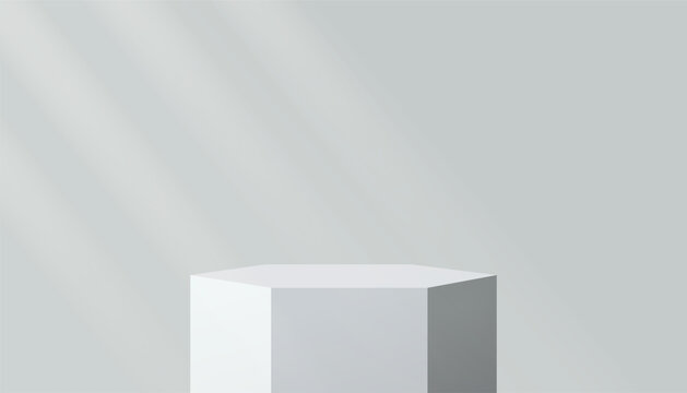 Minimalist White Hexagonal Podium Stand Against Light Gray Background with Soft Diagonal Lighting and Subtle Shadows