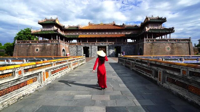 Tourist walking at Meridian Gate in Hue, Vietnam.