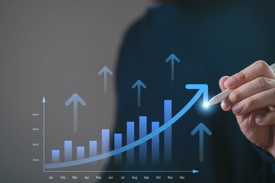 Business hand drawing upward growth chart with stylus representing financial growth, business performance, profit increase, investment success and strategic planning with data driven analytics.