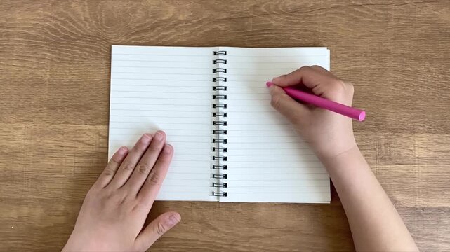 writing number 8 in small notebook