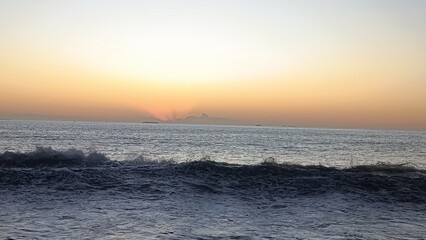 Fototapeta premium ocean wave at sunset